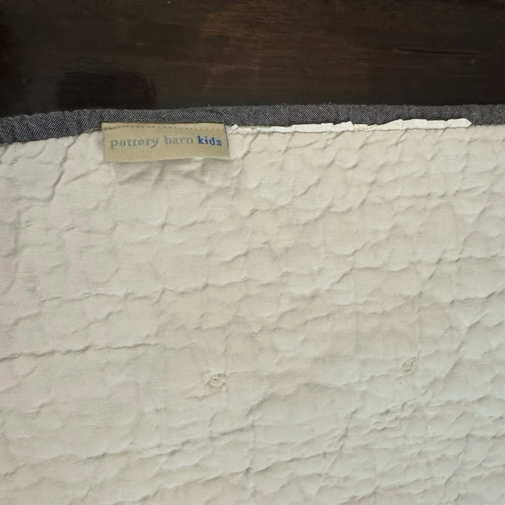 Pottery Barn Kids Shelby Sheep Baby Quilt features textured Sherpa sheep